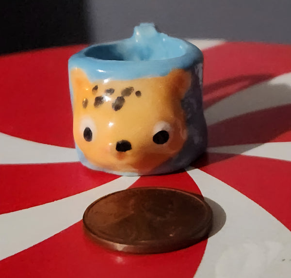 Miniature ceramic mugs, assorted animal faces