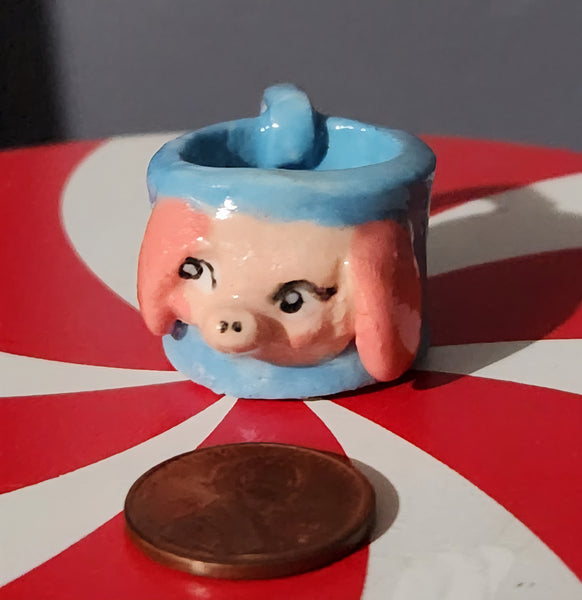 Miniature ceramic mugs, assorted animal faces