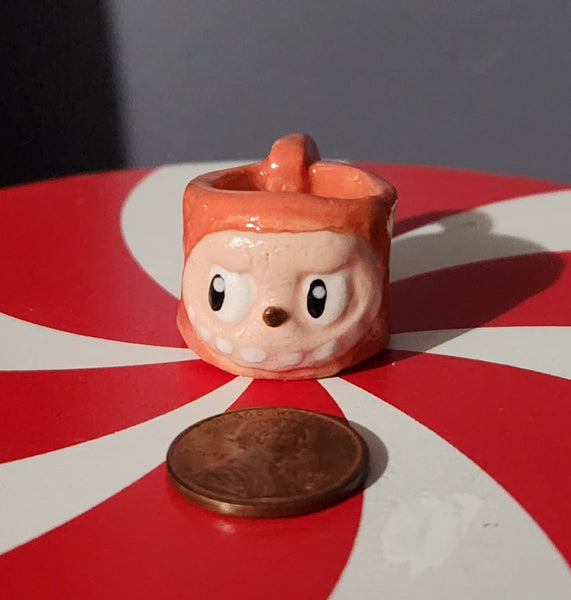 Miniature ceramic mugs, assorted animal faces